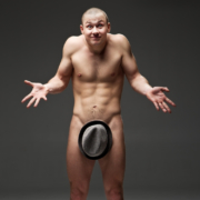 man's stiffy holding up hat - MarriageHeat.com