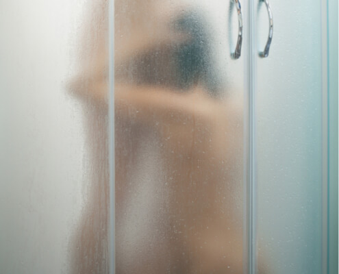 Wife kneeling before husband in the shower ~ MarriageHeat