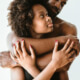 Husband wraps wife lovingly in his arms from behind ~ MarriageHeat