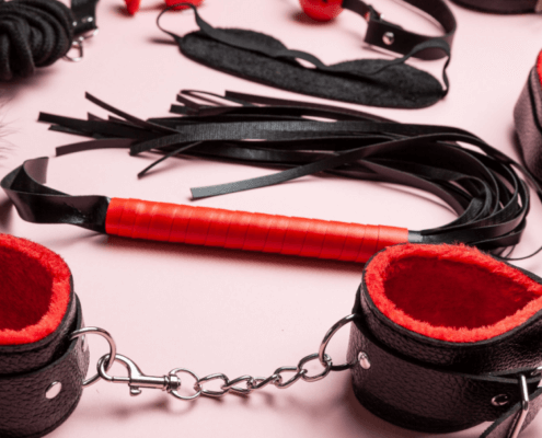 Collection of black-and-red BDSM implements ~ MarriageHeat