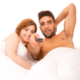 Husband and wife in bed watching a sexy video of themselves ~ MarriageHeat