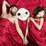 A husband and wife share cake and hold hands under silky red sheets~ MarriageHeat
