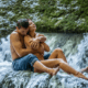 Loving married couple embrace under a waterfall ~ MarriageHeat