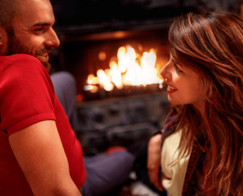 Huband and wife reawaken the passion in front of a roaring fire ~ MarriageHeat