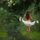 A sexy woman removes her wrap to enjoy a nude swim in the river ~ MarriageHeat