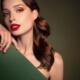 Young lady peeking out from behind a green board ~ MarriageHeat